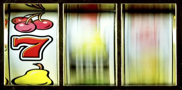 Reactoonz game grid showing colorful cartoon symbols